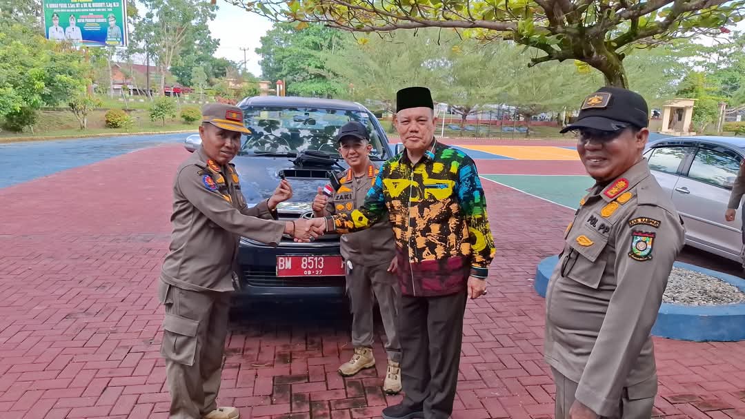 Layak Dicontoh, Kabid Gakda Satpol PP Kampar Serahkan Mobil Operasional Usai Pensiun
